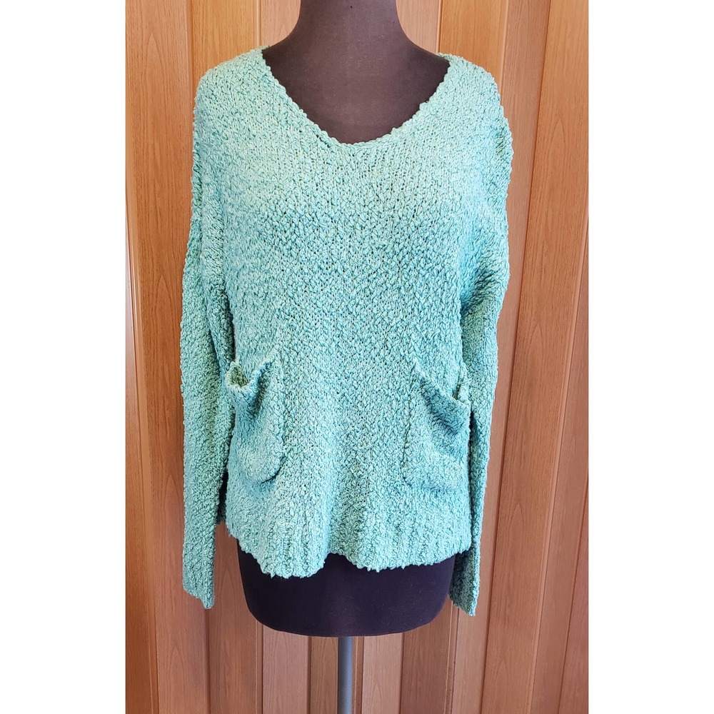 The Rage size small mint green sweater